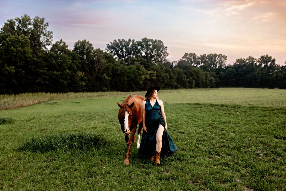 Horse outdoor Maternity session with expecting mom in Wabash at local homestead during family maternity session.
