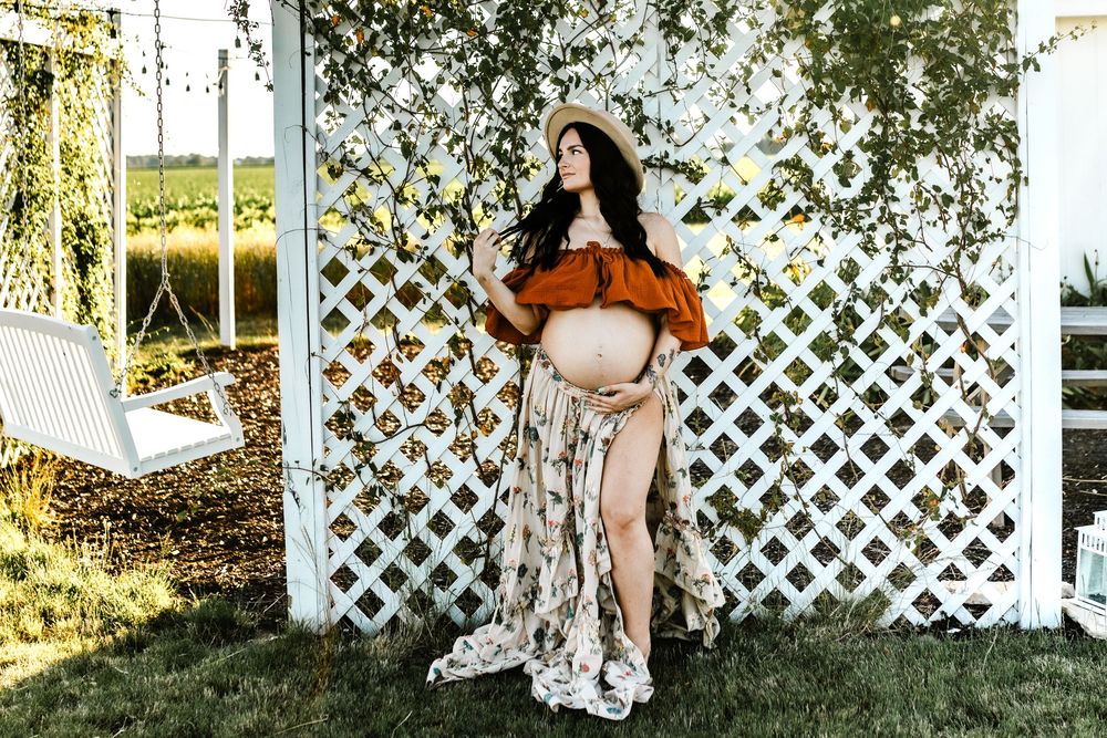 Outdoor Maternity session with expecting mom in Wabash at Wildblooms U pick flower farm.