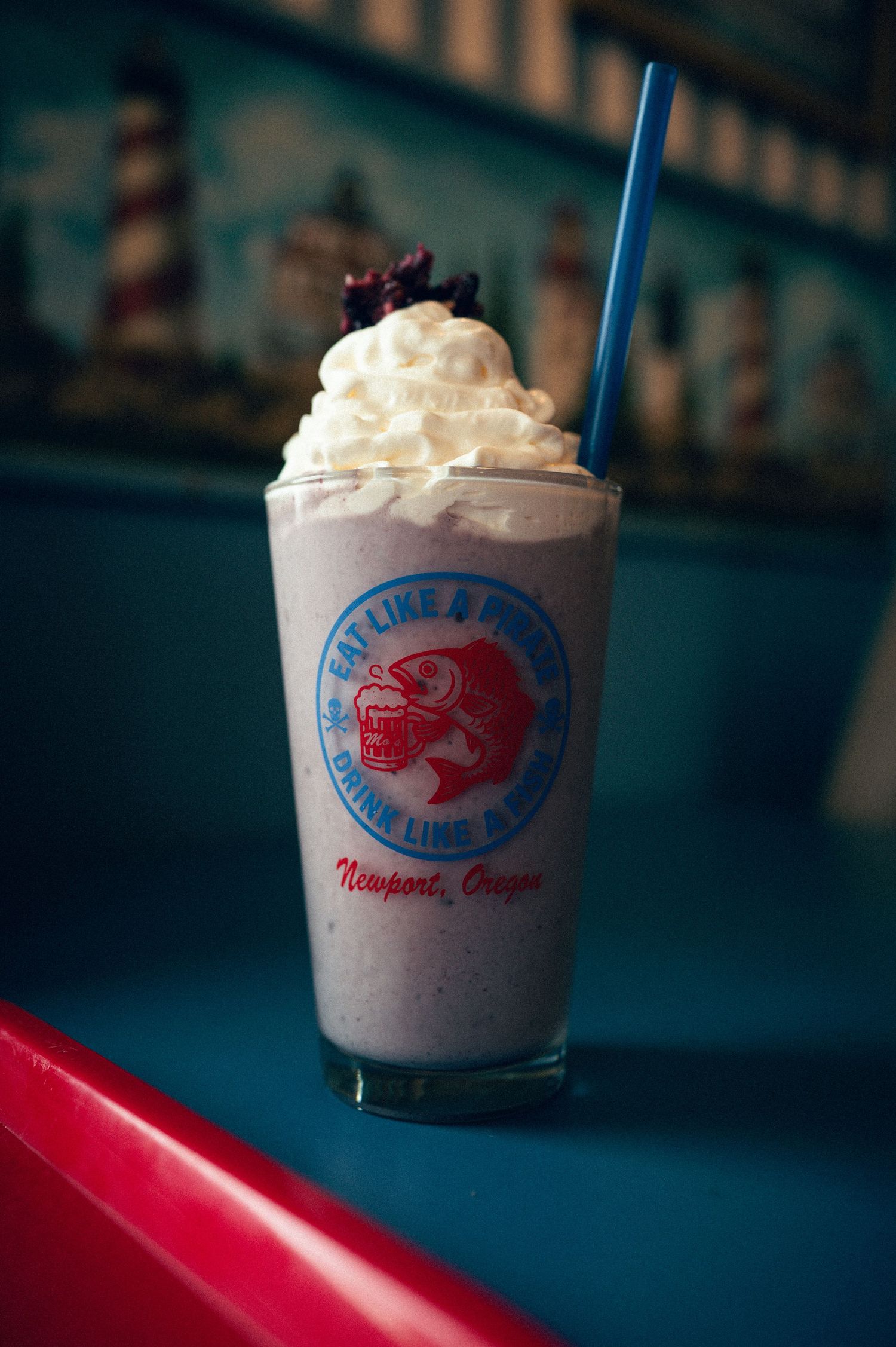 Moe's Marionberry Milkshake at Devil's punchbowl lookout. Oregon Coast Road trip travel photography - outdoor focused travel photography.