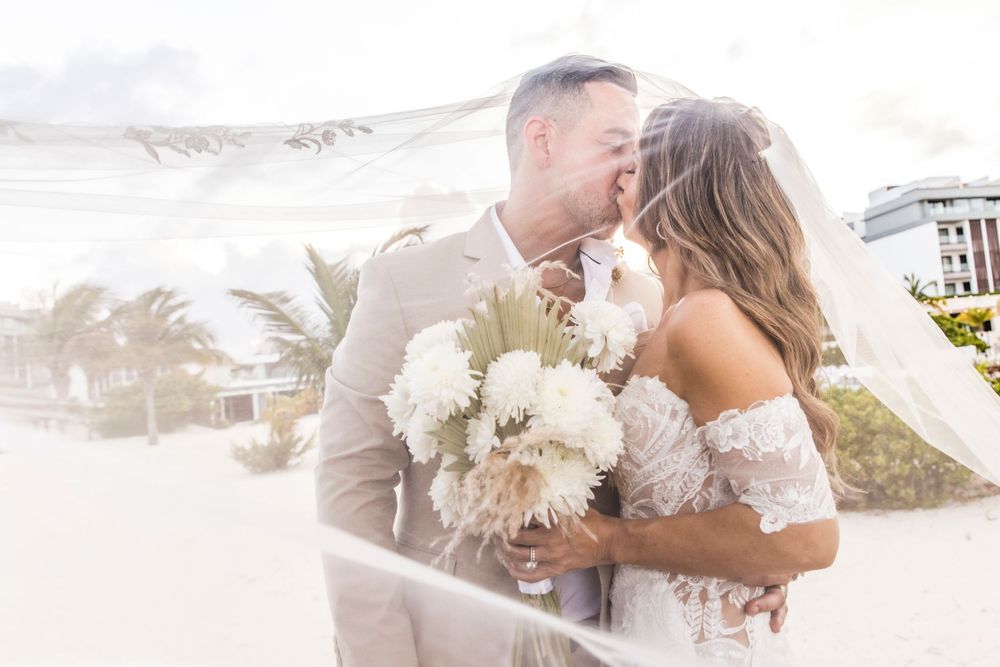 A romantic wedding couple shares tender moments in a series of soft, light-filled outdoor photographs.