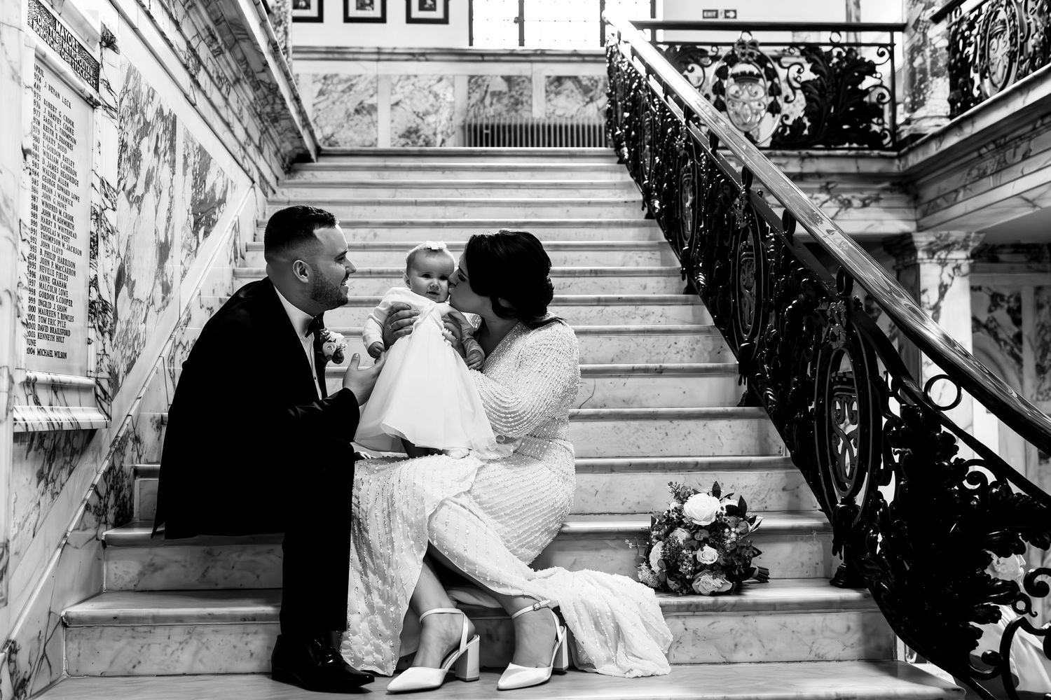 wedding photography couple with daughter stockport registry office marble staircase Greater Manchester Tameside