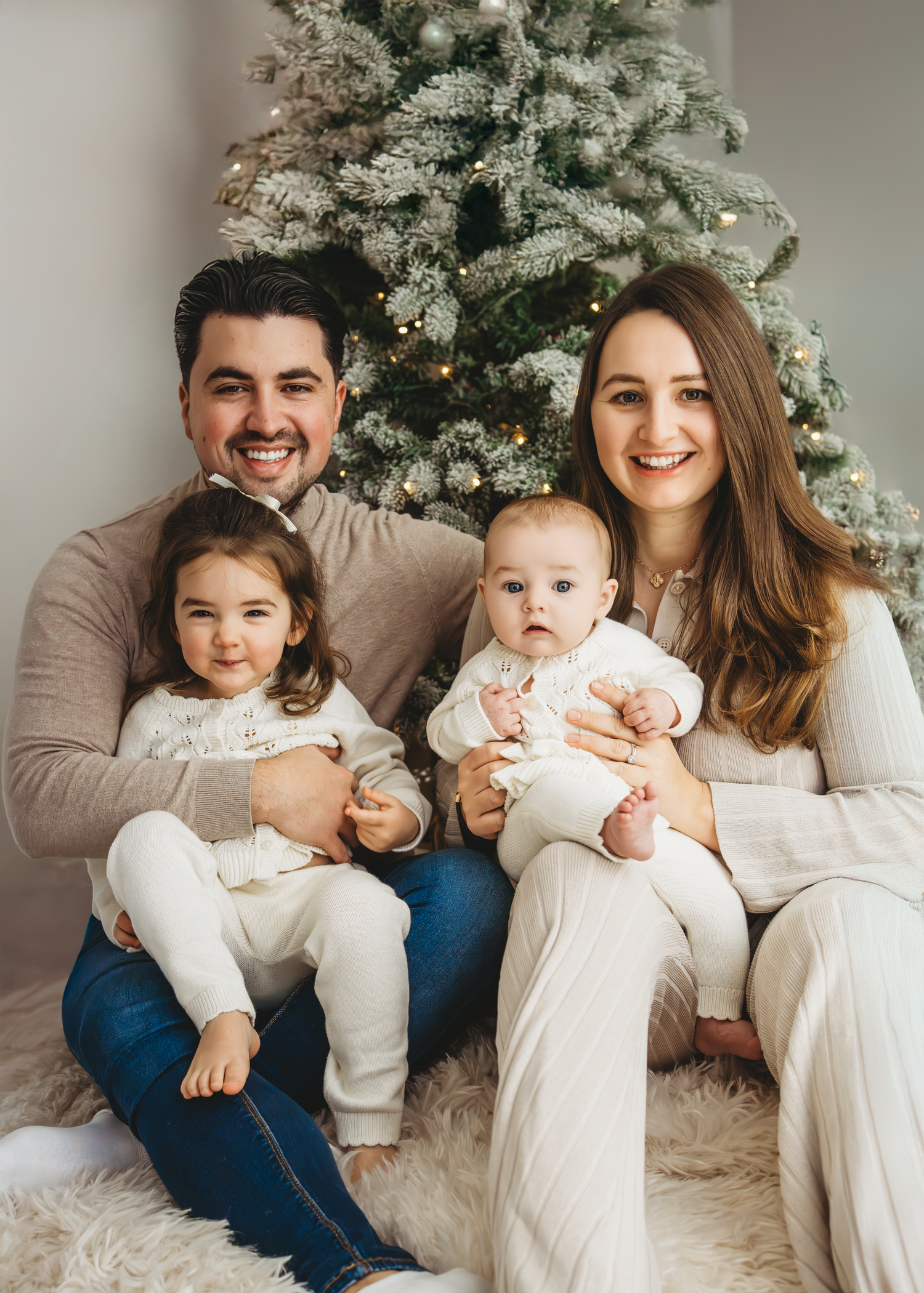 Cozy winter nursery scene with rustic decor featuring white wreath, wooden toys and soft textiles in neutral tones. Christmas Mini Photos