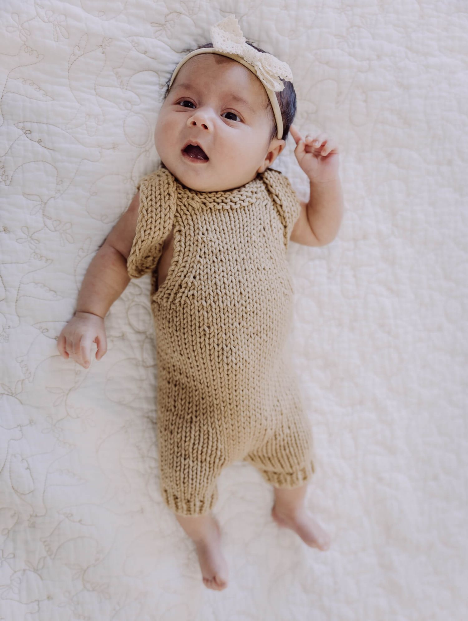 Lifestyle newborn session in Bay Area with close-up of baby.