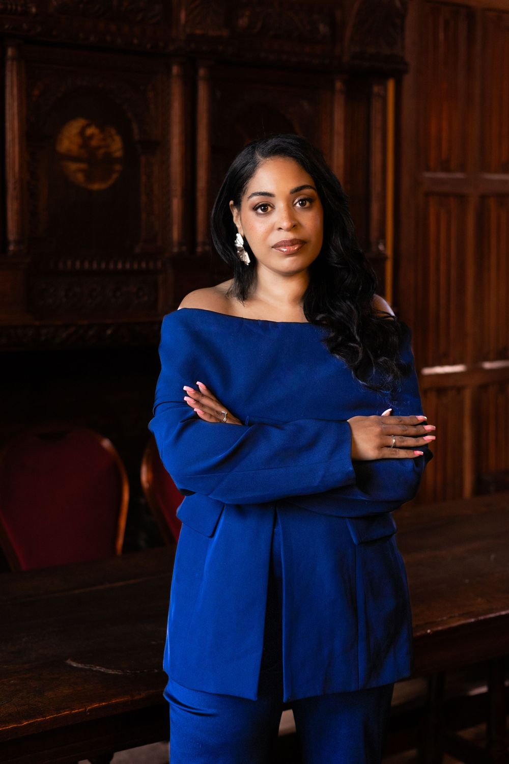 personal branding  at Tudor room in the Christchurch mansion ,Ipswich.bold colours, cultural fusion,woman, standing, arms crossed, confident