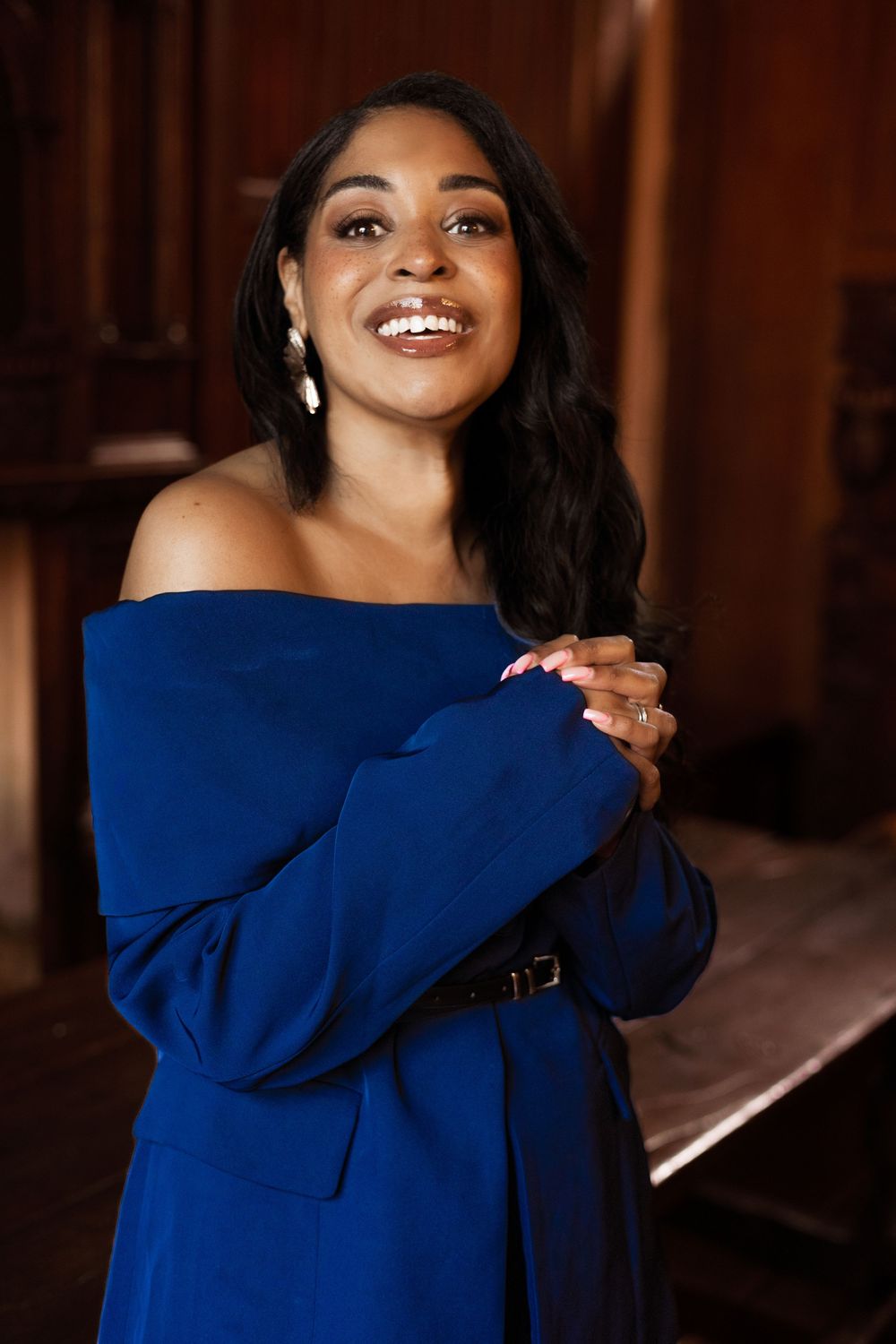 personal branding portrait at Tudor room in the Christchurch mansion ,Ipswich.bold colours, cultural fusion,woman