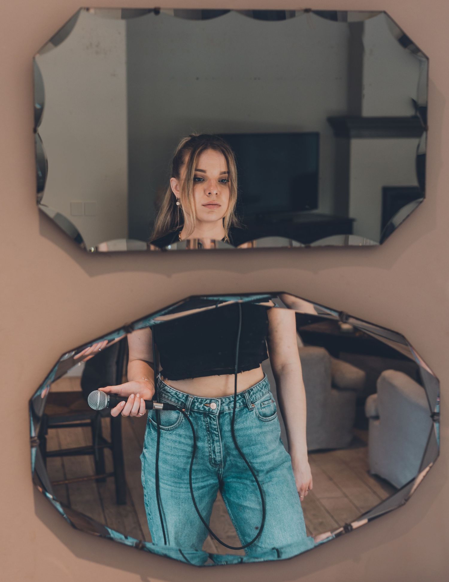 Creative mirror selfies showing reflections in uniquely shaped vintage mirrors.