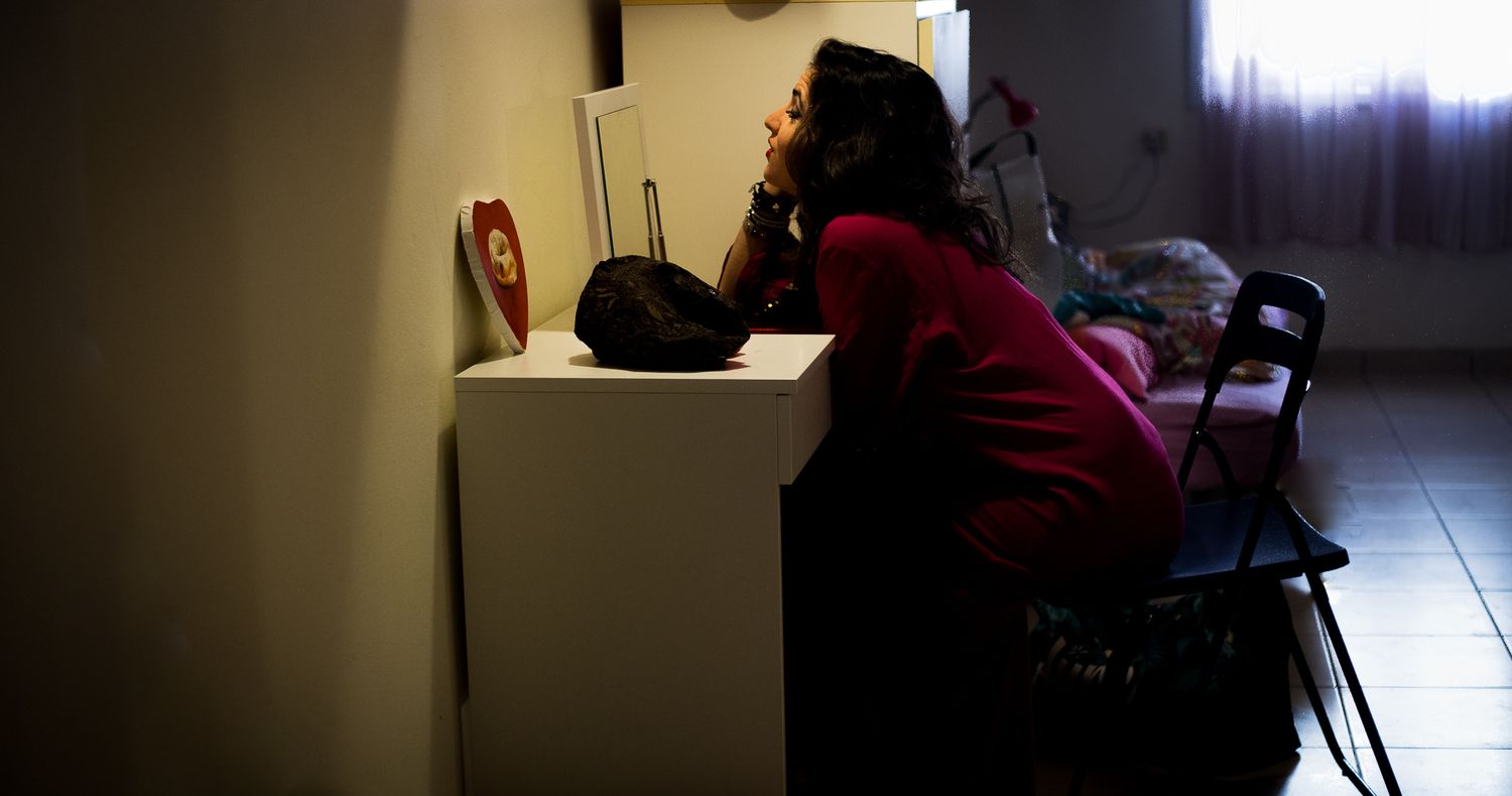 Dramatic low-light interior shots showing silhouettes of furniture and room details.
