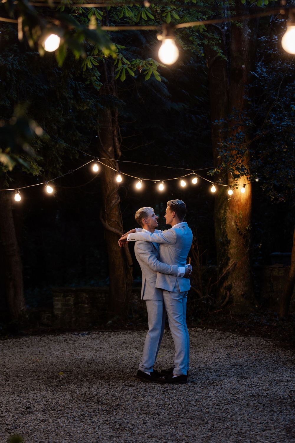 Couple dancing under the fairy lights The Ravenswood