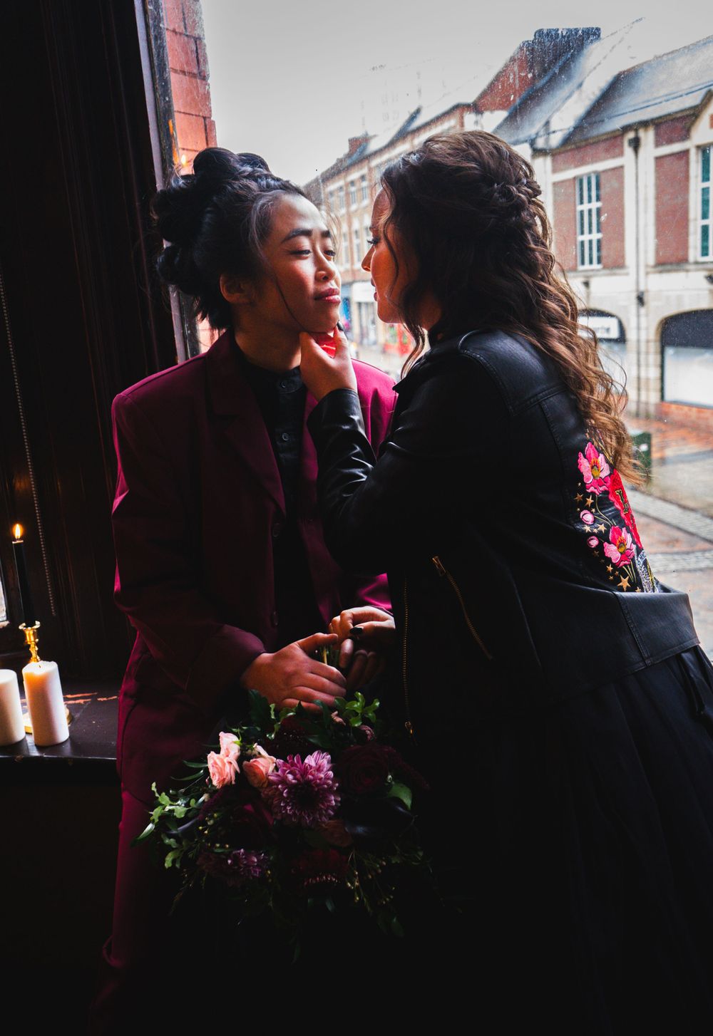 LGBTQ+ wedding, Lesbian wedding, alternative, Pub wedding, Doc Marten wedding, Leather jacket, Black wedding dress, red suit, Gothic,