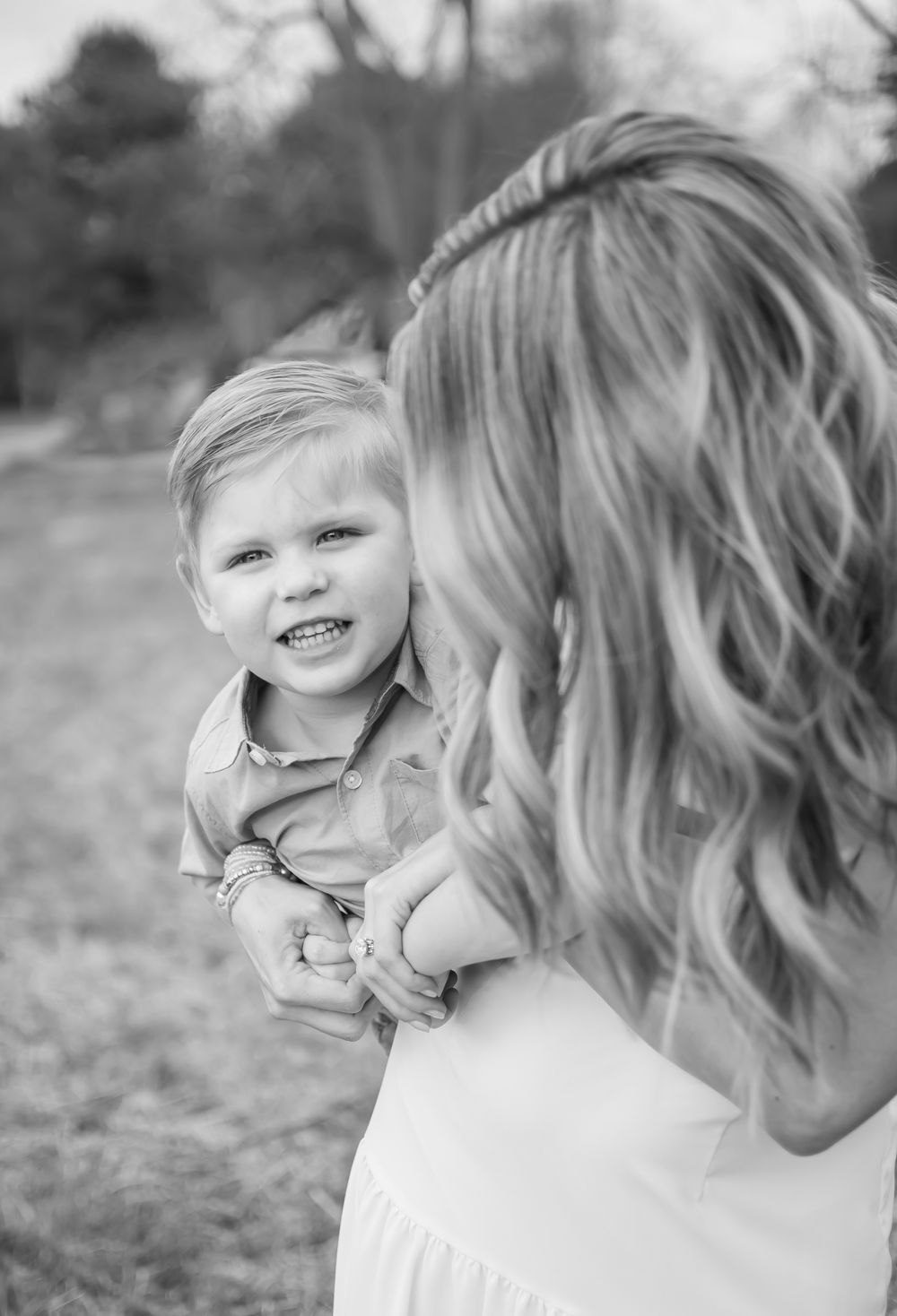 mother holding son for a family photo session