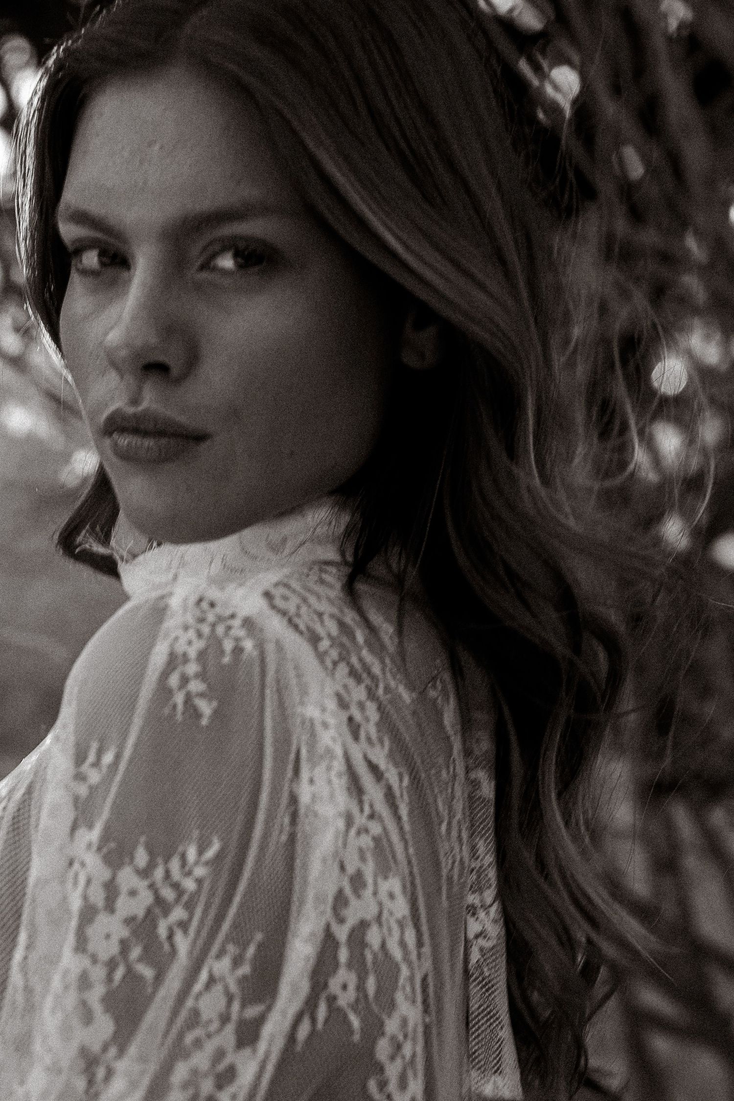Intimate black and white fashion portrait series featuring lace details.