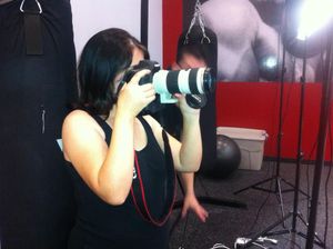 Behind-the-scenes video shoot in an indoor studio space.
