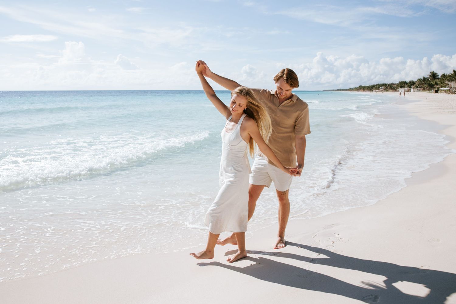 Engagement photos at Tago Tulum. Romantic beach session for a couple before their destination wedding in Tulum, Mexico. Tulum photographer