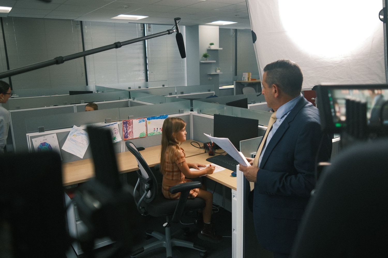 Professional interview or filming setup in an office environment.