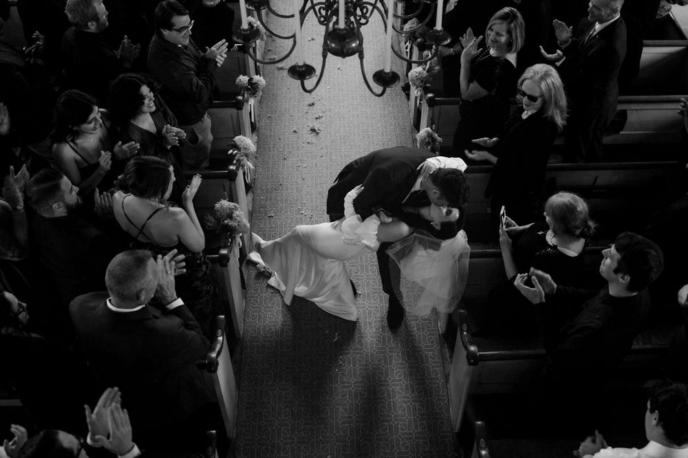 Overhead black and white shot of wedding dance celebration.
