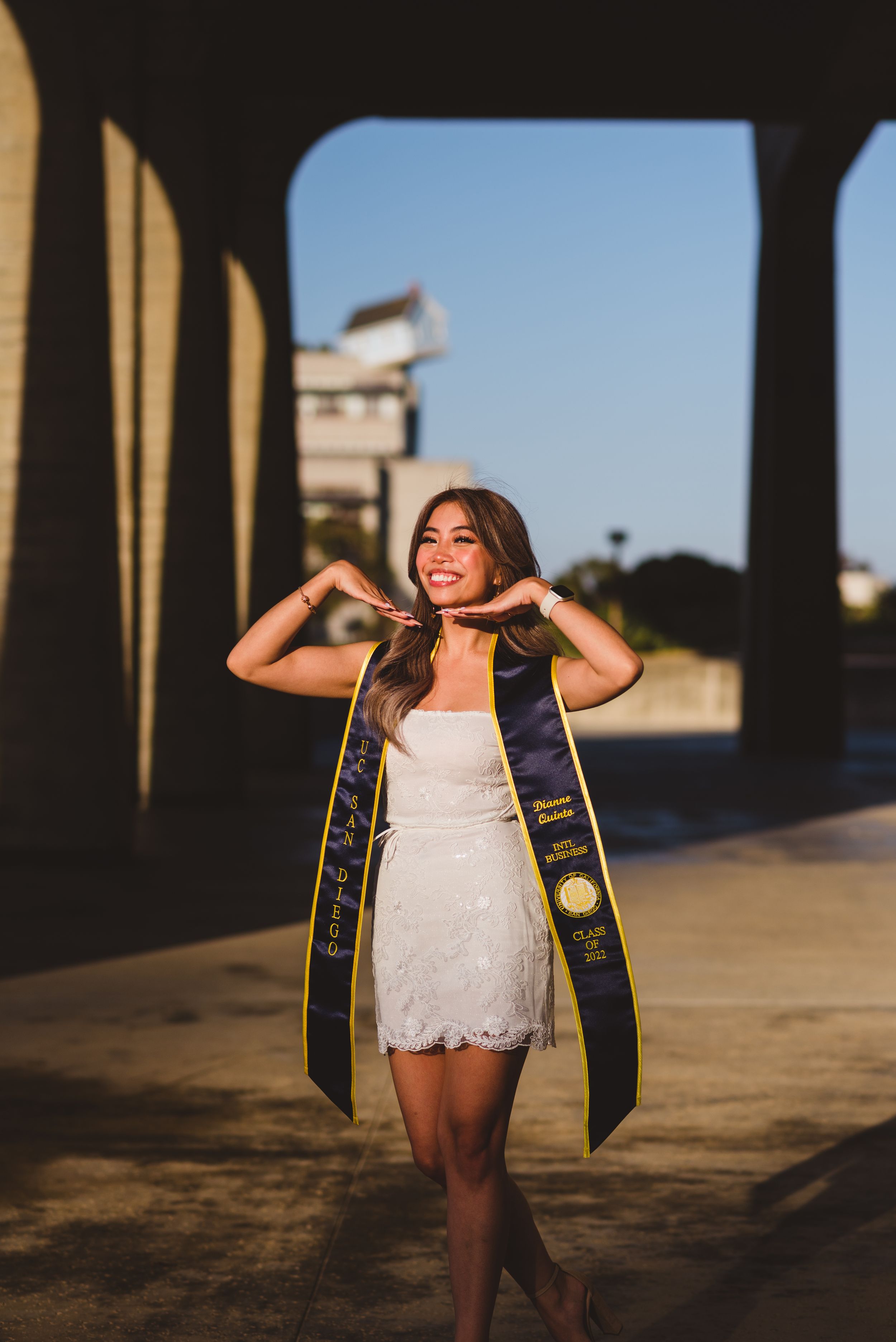 UCSD graduate posing for a photo.