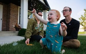 A sequence of four candid outdoor photos showing joyful interactions between people in a backyard setting.