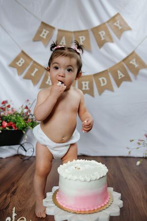 First birthday cake smash photo session.