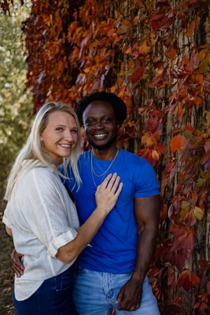 Multi racial couple enjoying fall at elm creek park reserve