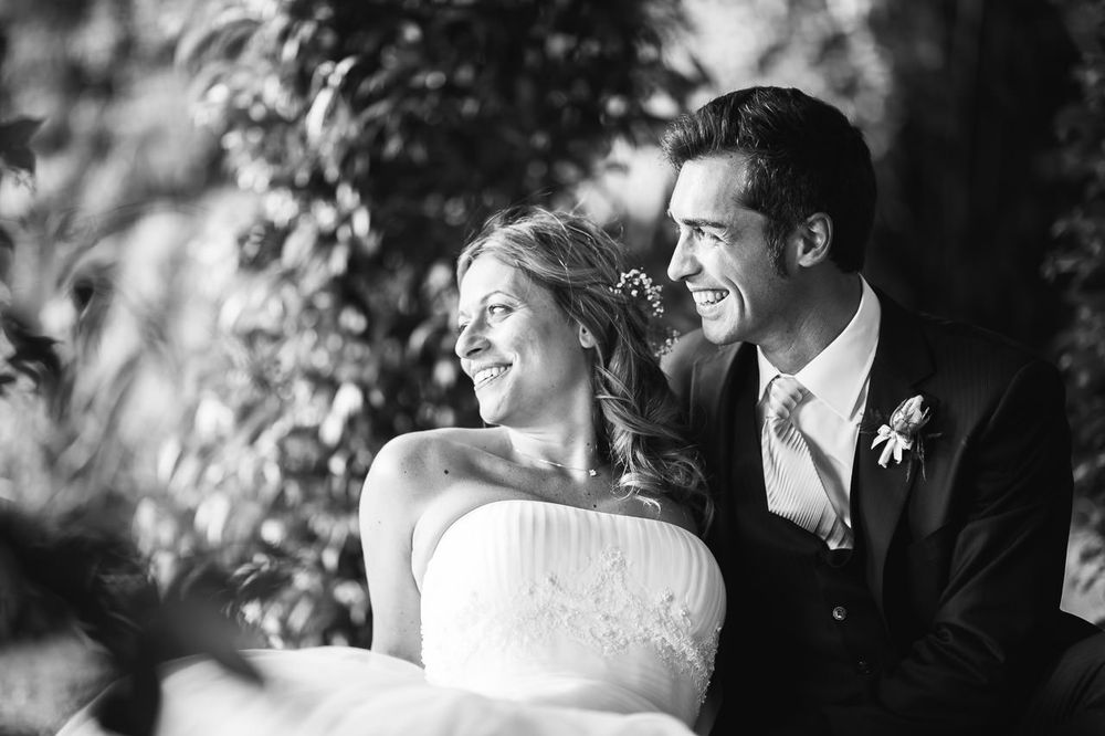 Romantic black and white wedding portraits showing tender moments between newlyweds.