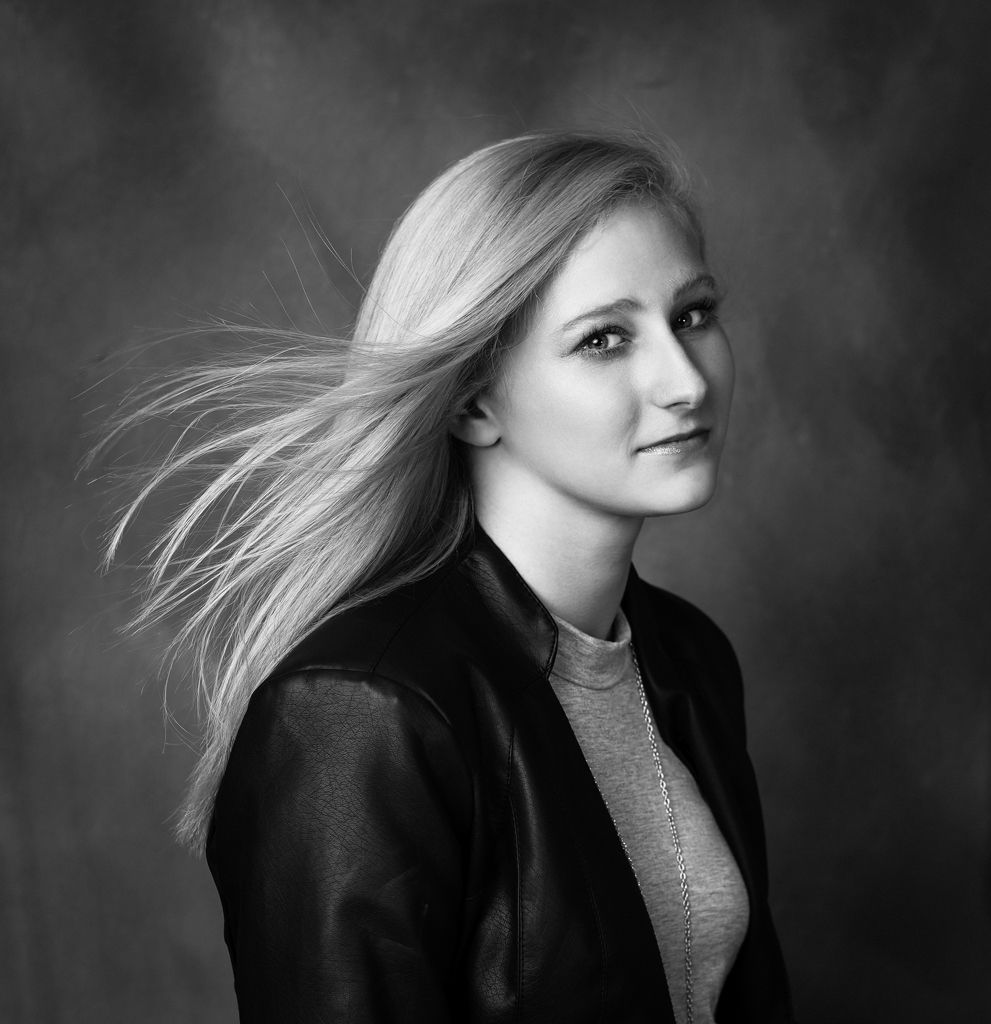 Black and white portrait series showing side profile shots of a flowing blonde hair movement sequence against dark background.
