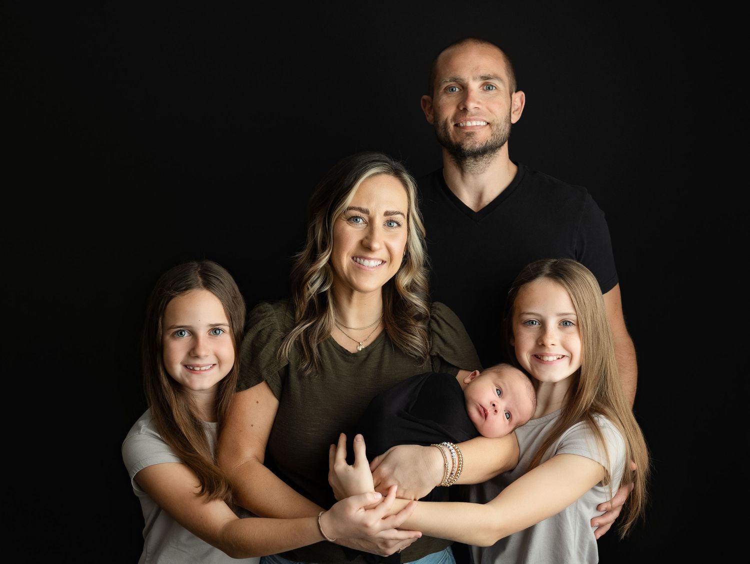 Family of 5 holding newborn boy. Greenville SC newborn photographer, Easley, SC newborn photographer