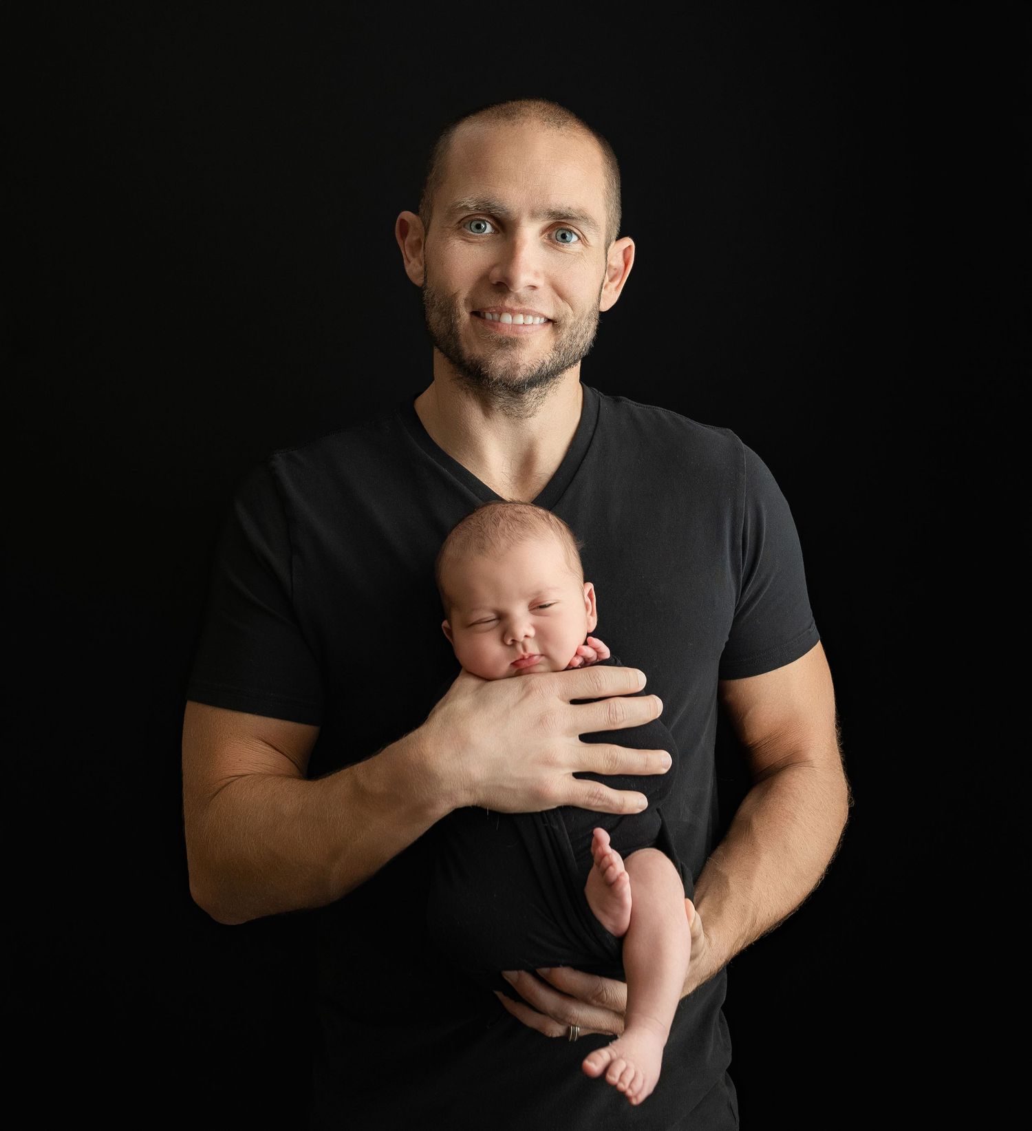Father holding his newborn boy. Greenville SC newborn photographer, Easley, SC newborn photographer