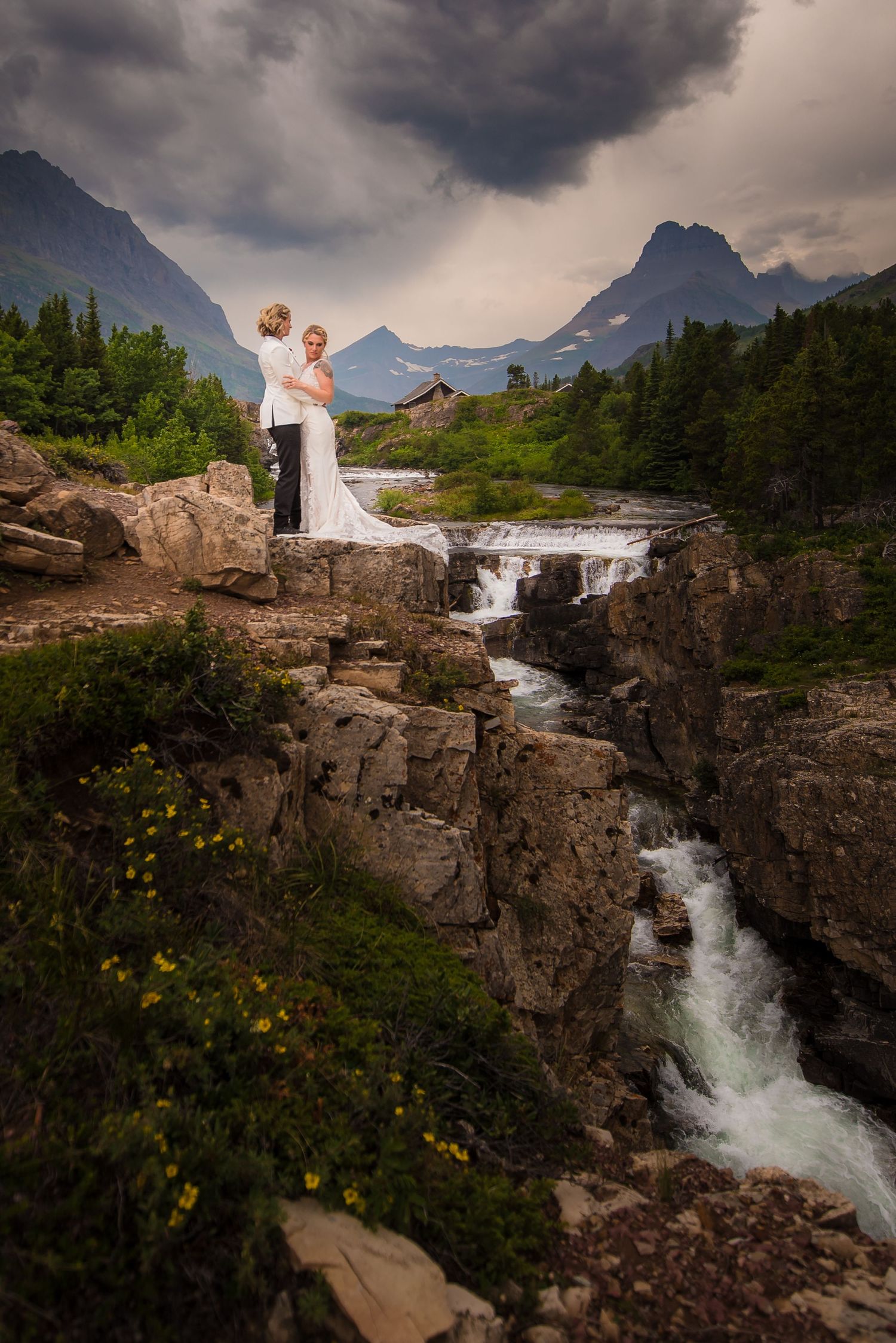 LGBTQ Glacier National Park Elopement Black and white couple on mountains