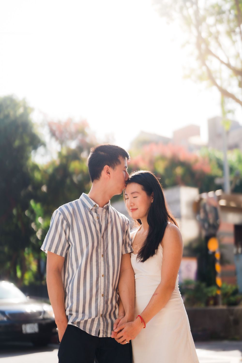 A kiss on the head at Dihua Street in Dadaocheng District in Taipei City.