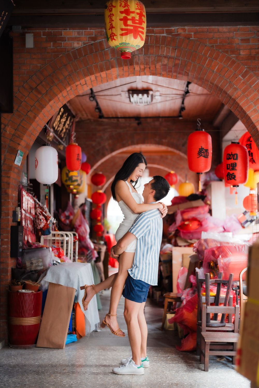 A couple at Dihua Street in Dadaocheng, Taipei City.