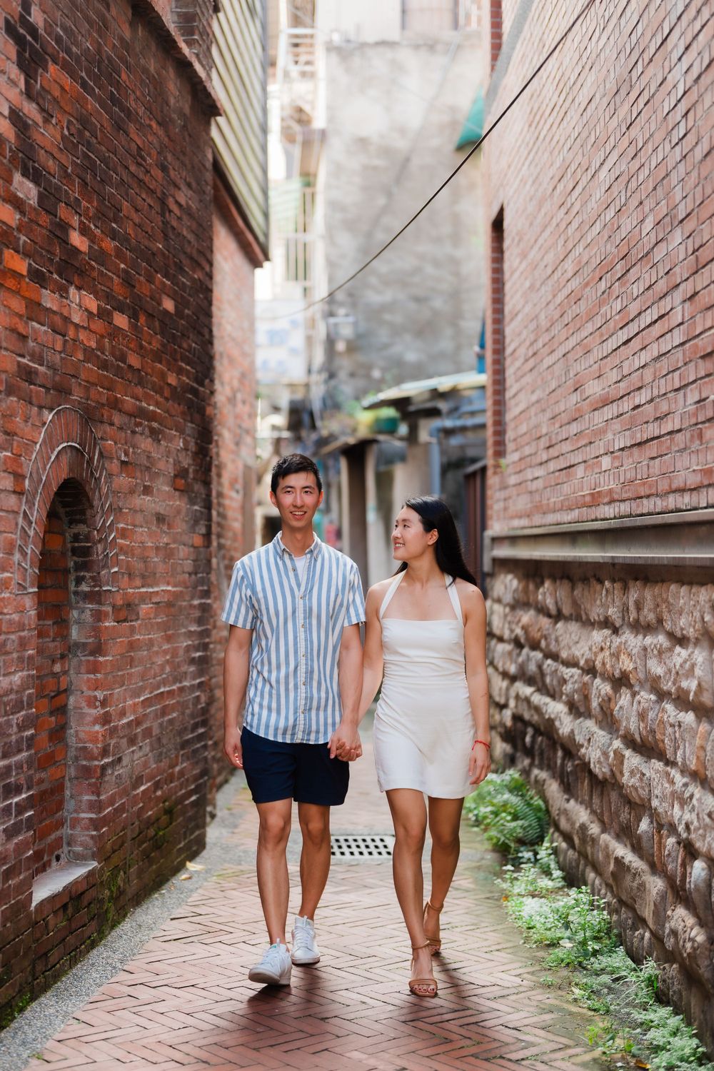 A couple at Dihua Street in Dadaocheng, Taipei City.
