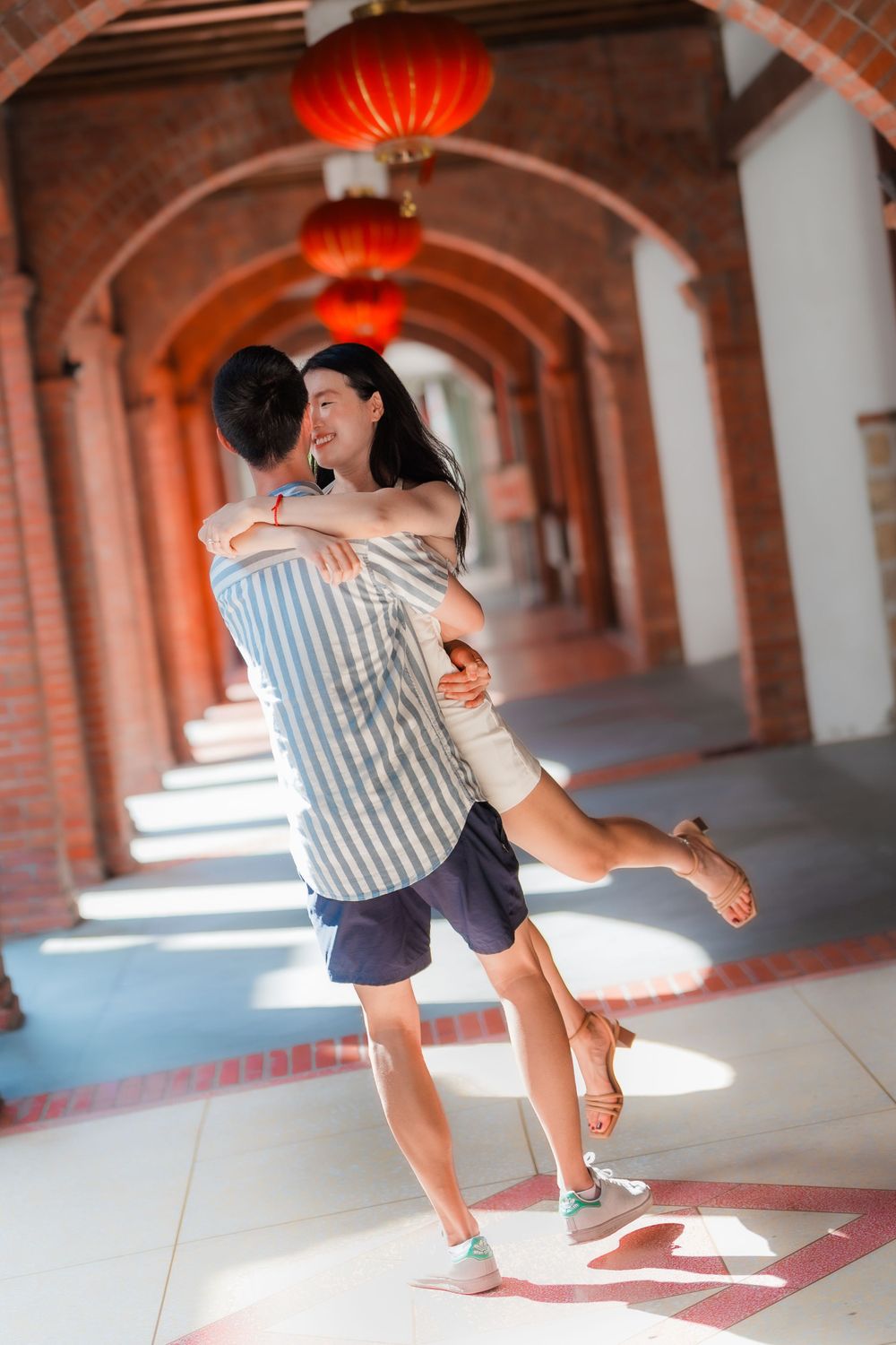 A couple at Dihua Street in Dadaocheng, Taipei City.