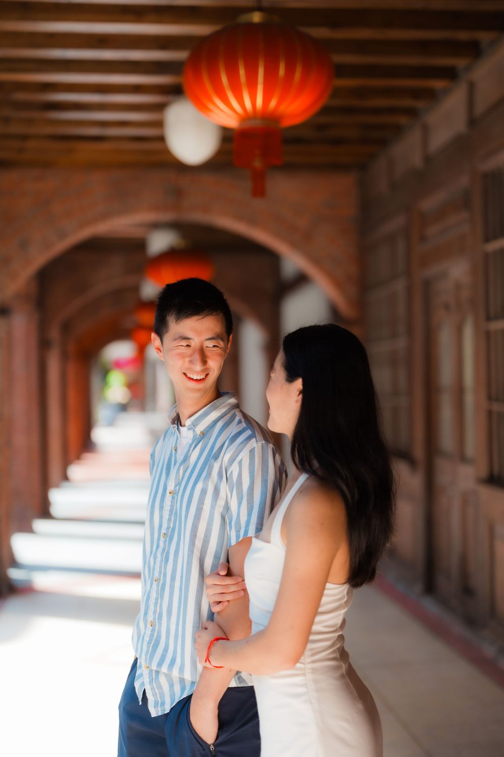 A couple at Dihua Street in Dadaocheng, Taipei City.