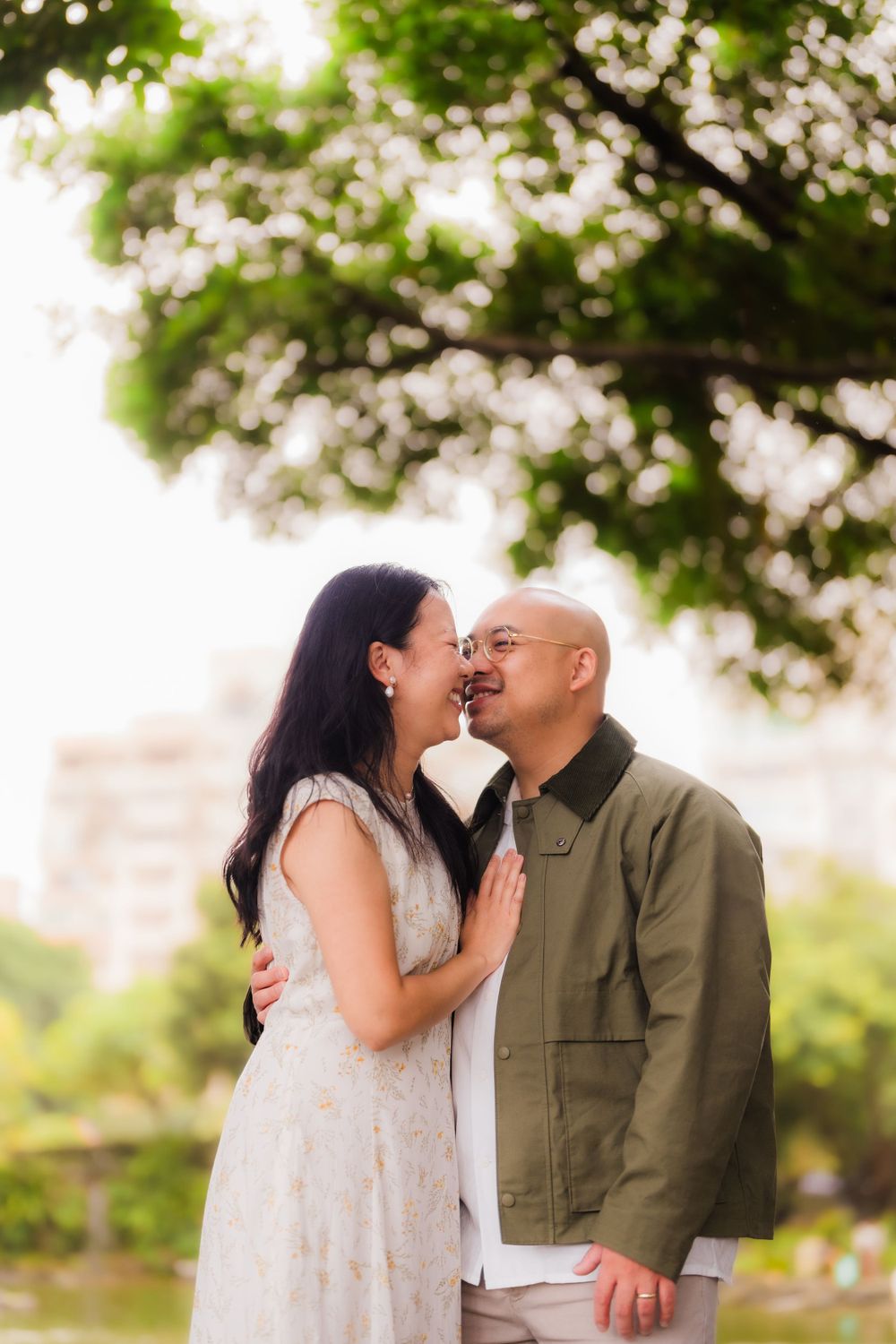 A couple kissing at Chiang Kai-shek Memorial Hall in Taipei City.