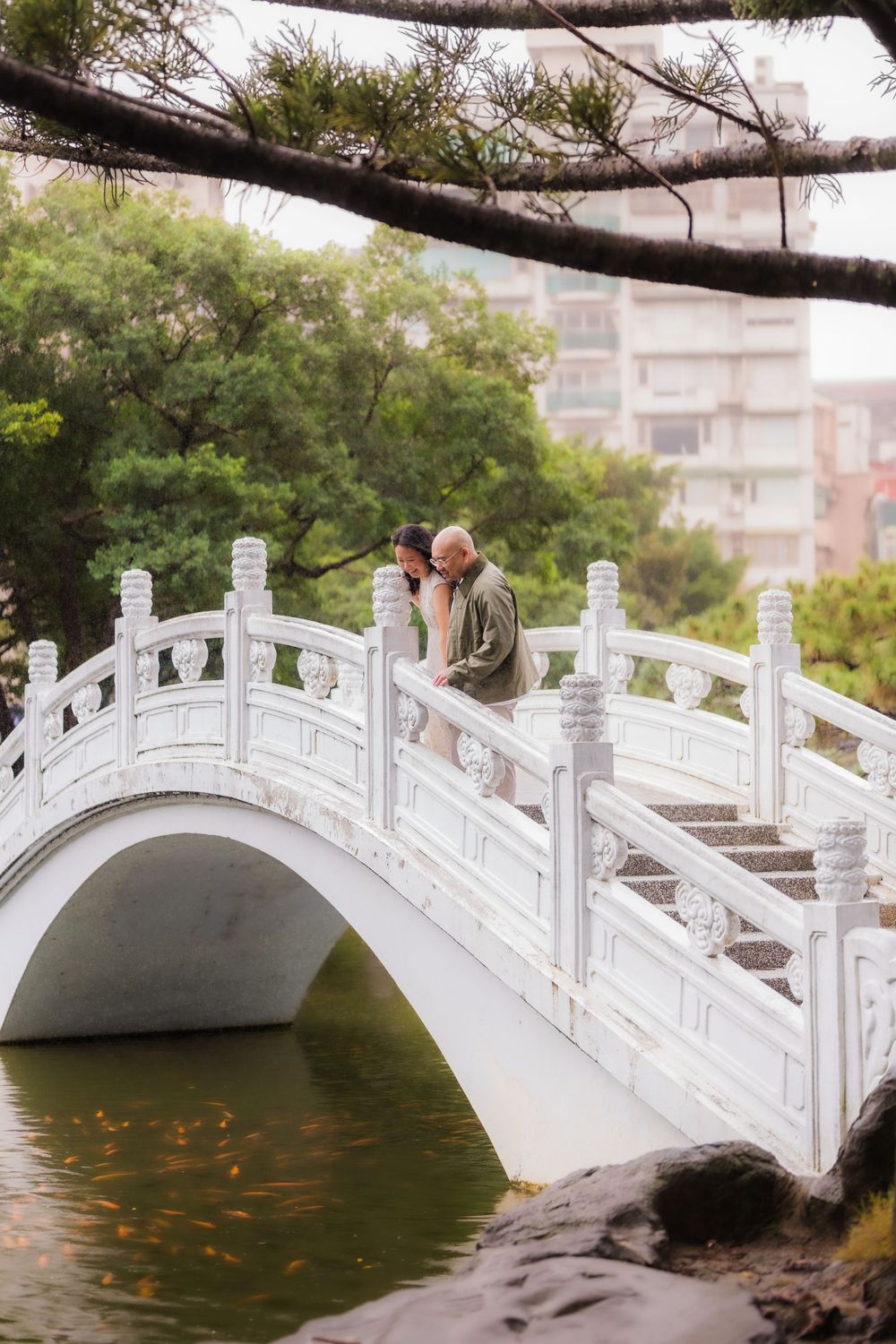 A couple on the bridge at Chiang Kai-shek Memorial Hall in Taipei City.