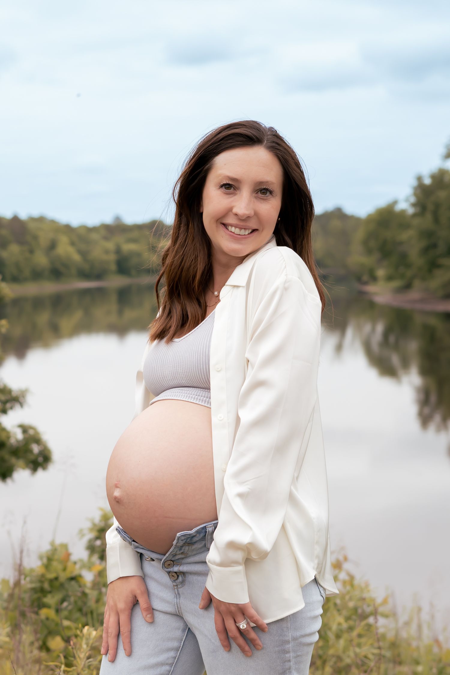 Maternity photos along the Mississippi River to celebrate this mother's second pregnancy.