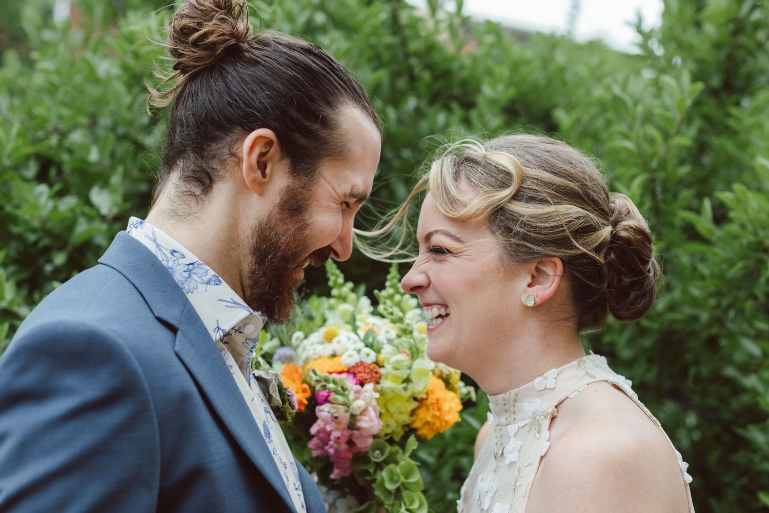 A romantic outdoor wedding photo sequence with floral arrangements and greenery.