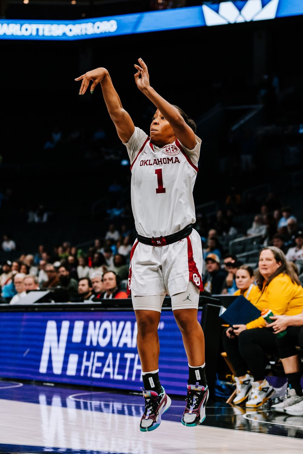 Oklahoma women's basketball player #1 shoots a jump shot during a game at Spectrum Center.