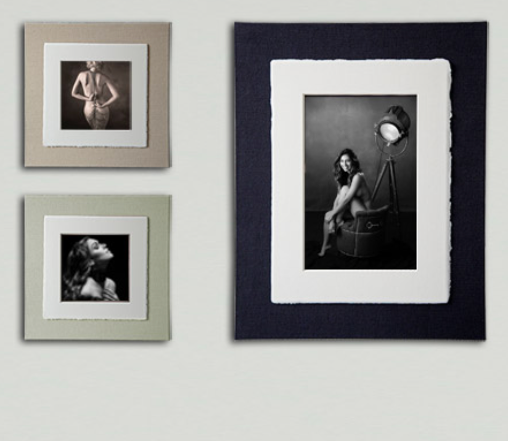 Statement wall decor with handcrafted double frame from portrait session.