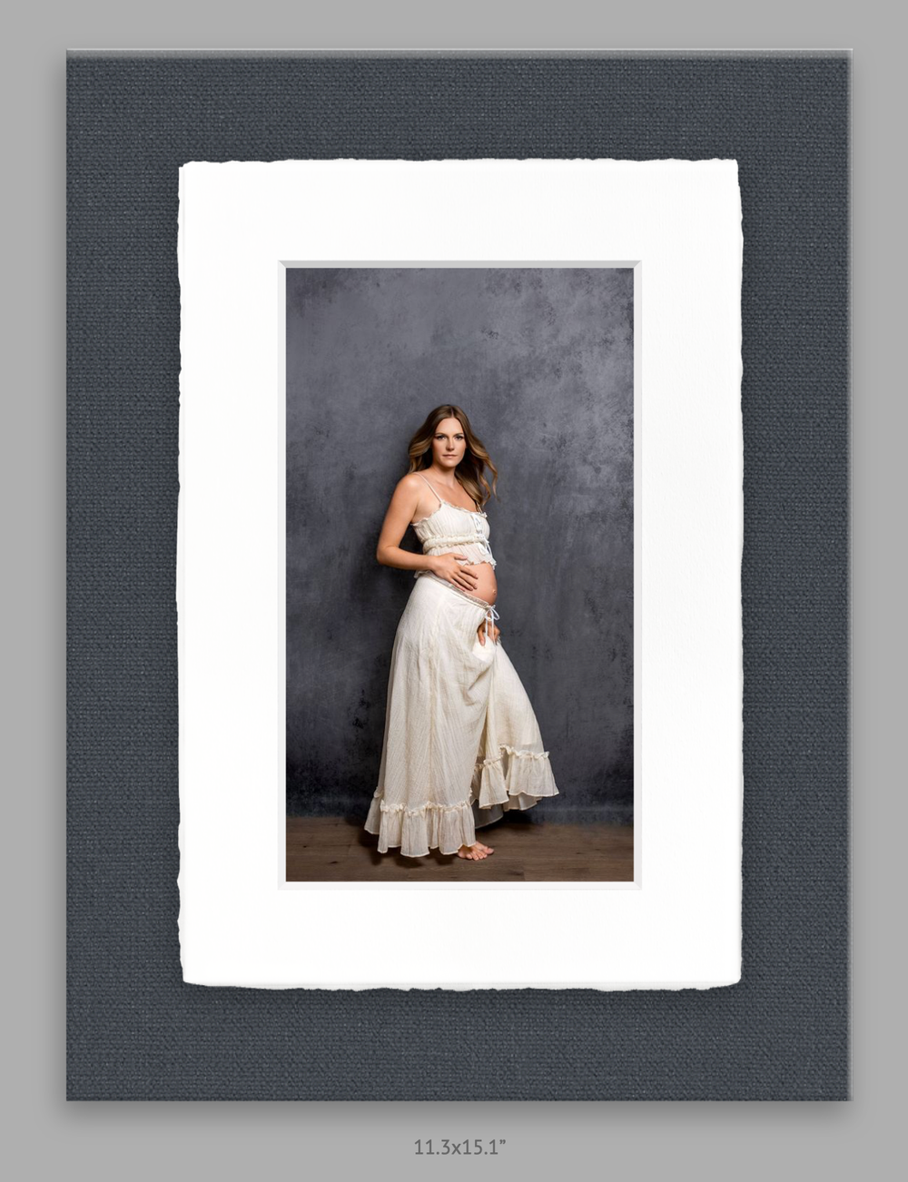 Fine art pregnancy couple photo in Nashville photography studio.