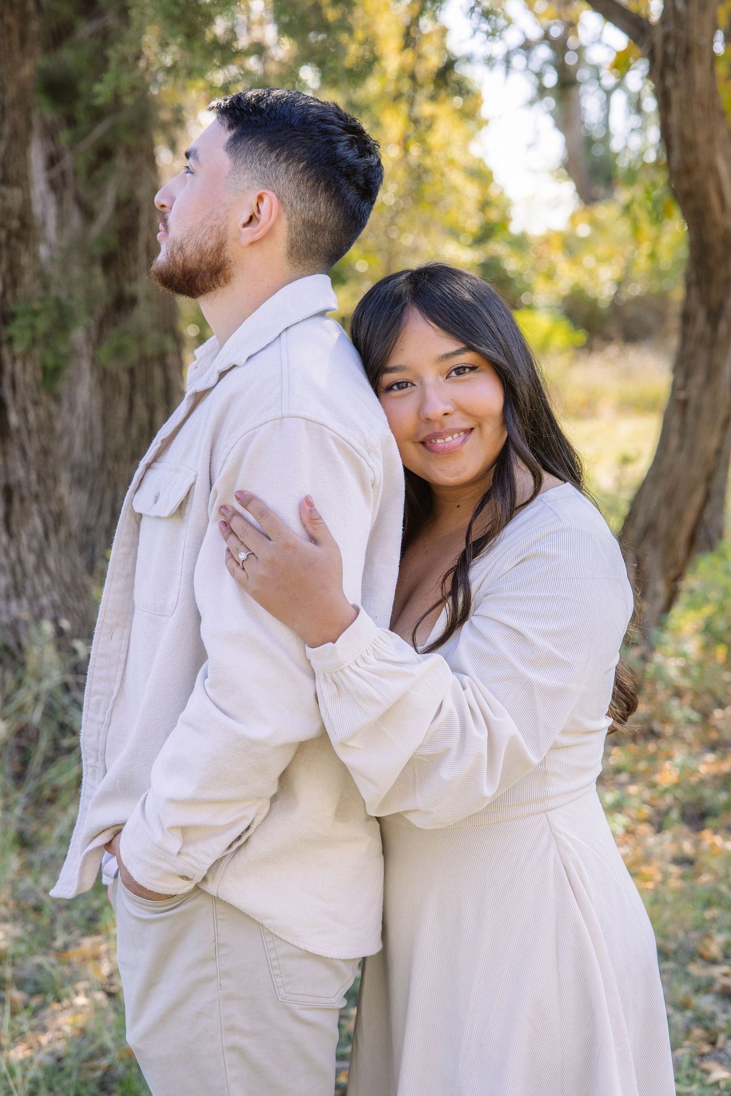 Engaged couple taking engagement pictures in Buffalo Gap Texas
