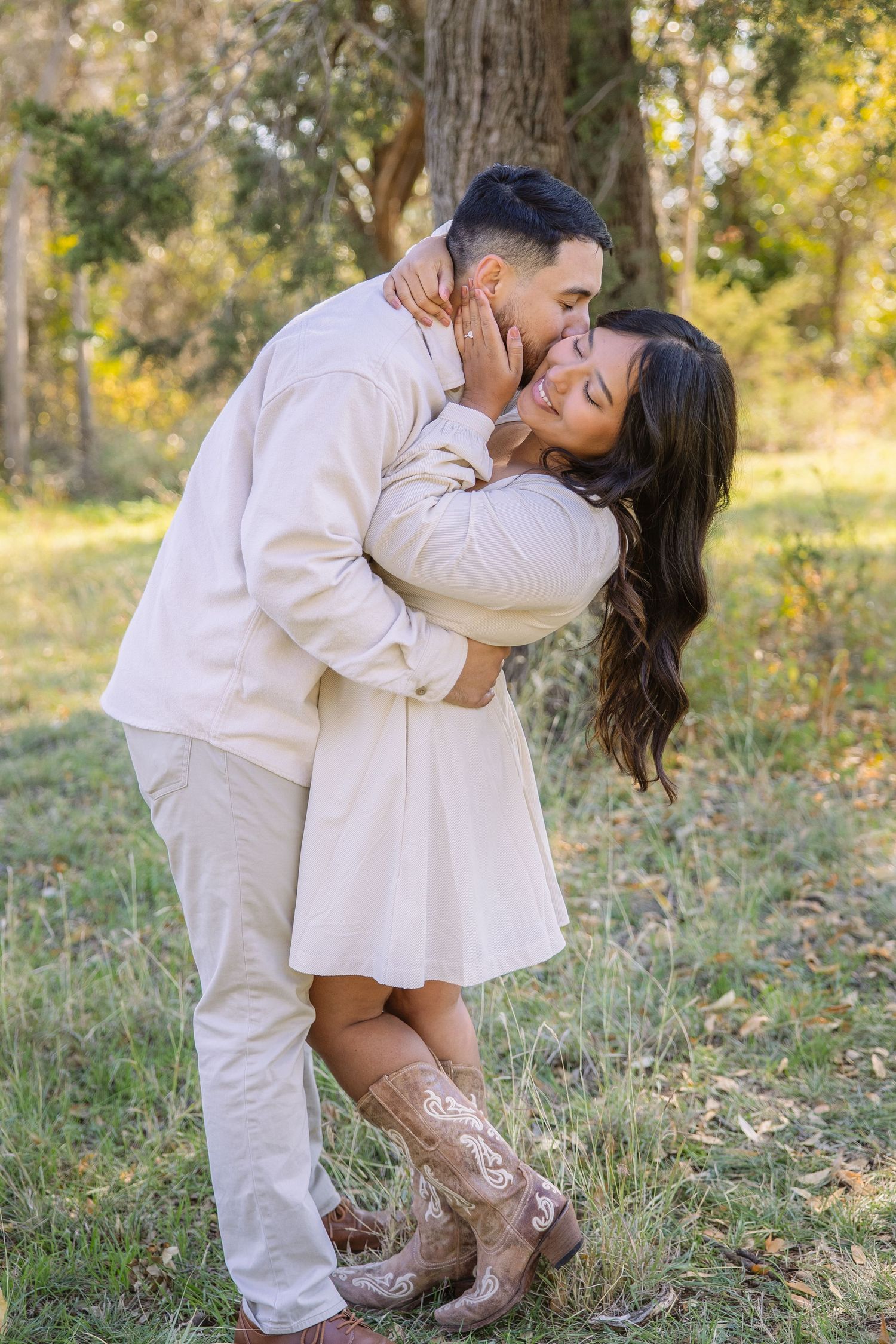 Engaged couple taking engagement pictures in Buffalo Gap Texas