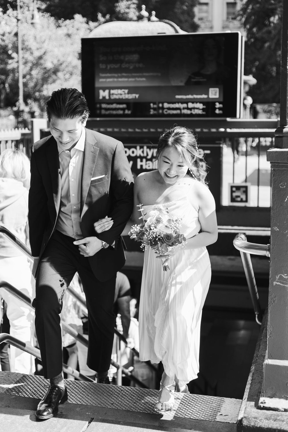 Black and white photo sequence shows a toddler in white dress playing while an adult watches from a bench.
