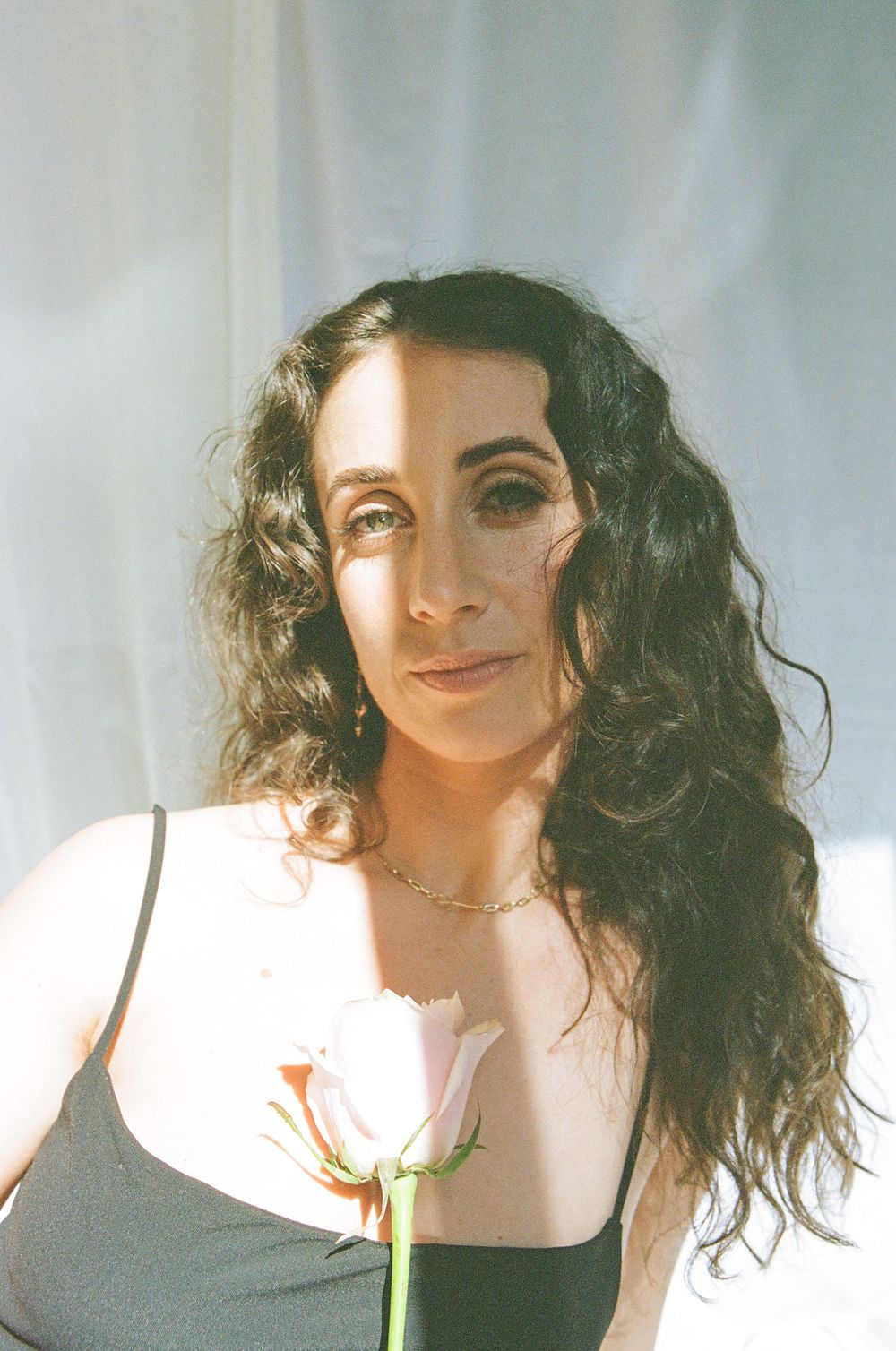 Professional branding photo of Gianna Martino in Perth, intimate and minimal portrait highlighting feminine empowerment
