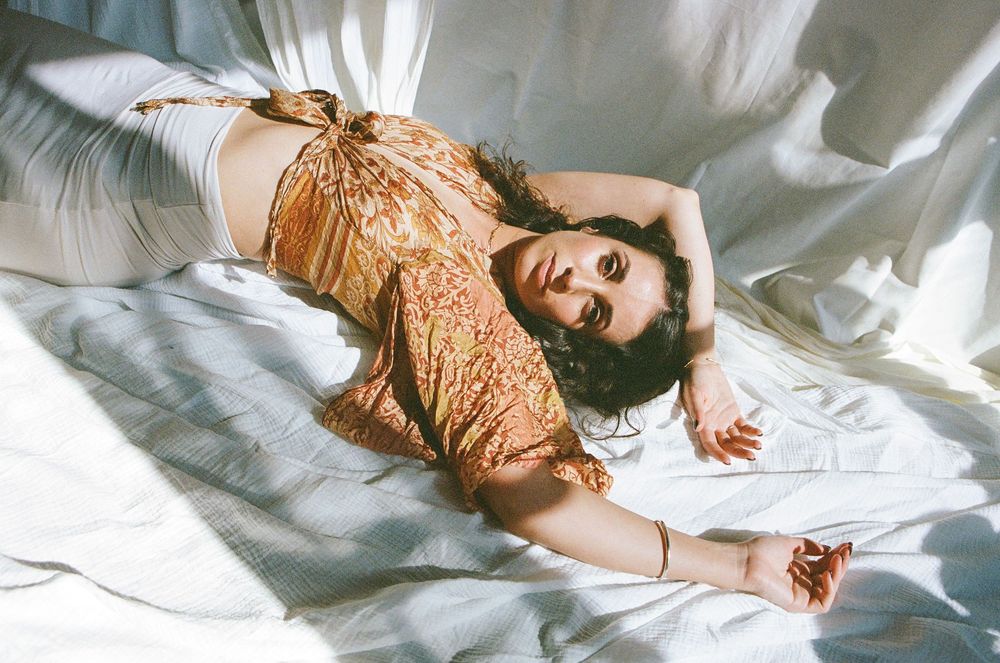 Intimate branding portrait of Gianna Martino, embodying safe, soft, and transformative energy