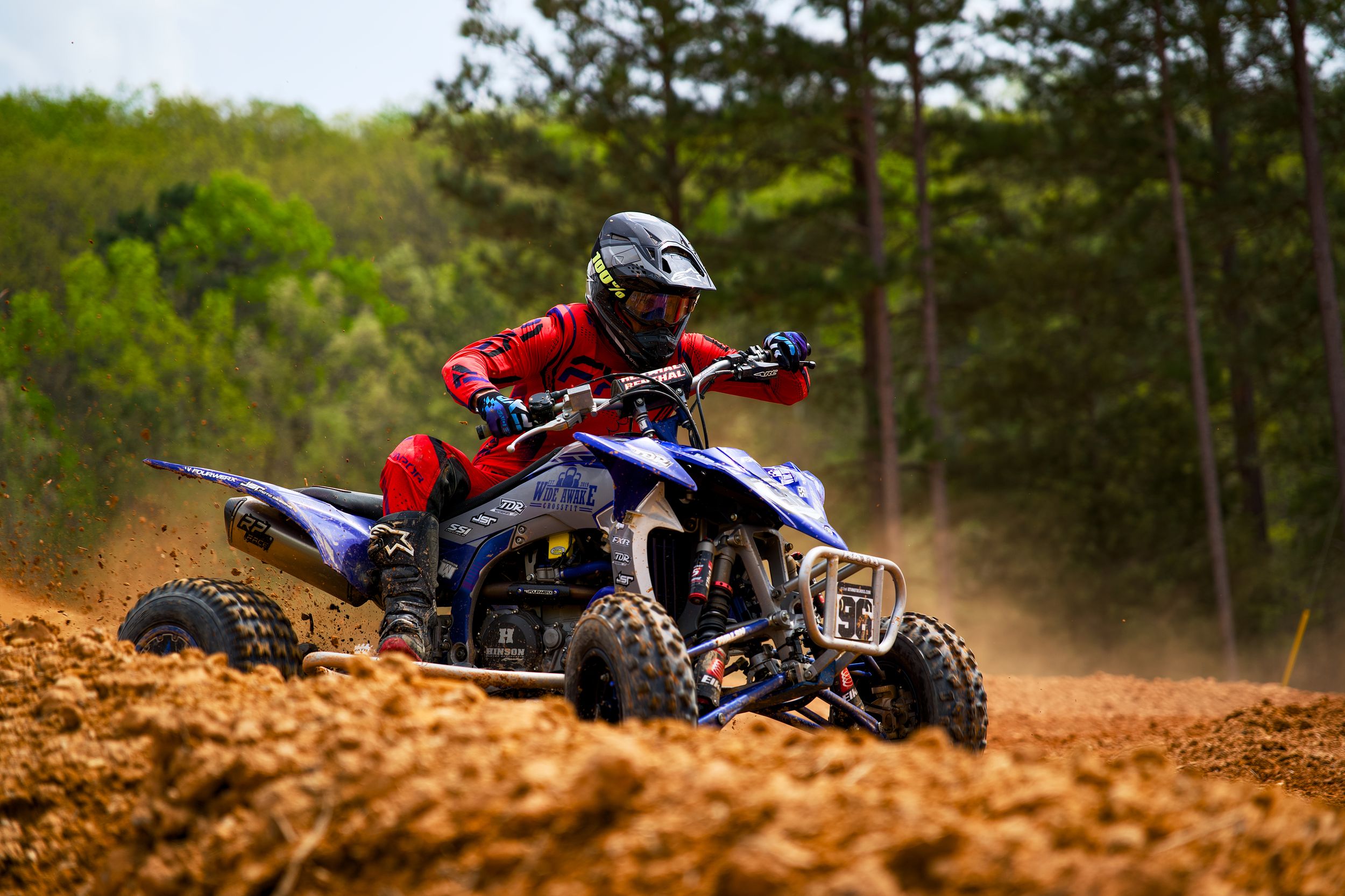 Blue Atv Sliding in the dirt