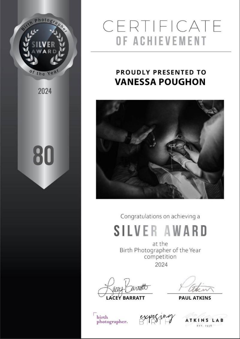 A silver and black certificate of achievement for Birth Photographer of the Year with an artistic black and white photo.