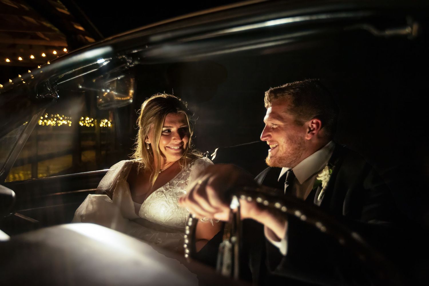 wedding couple in their car