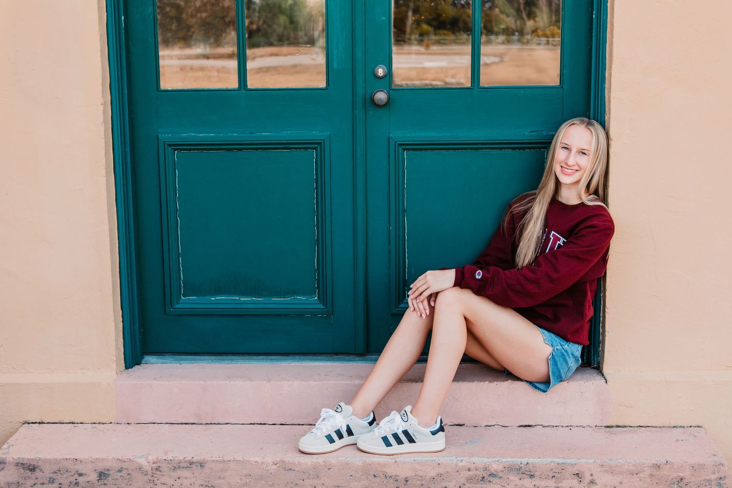 Senior portrait featuring teen girl in MSU college gear.