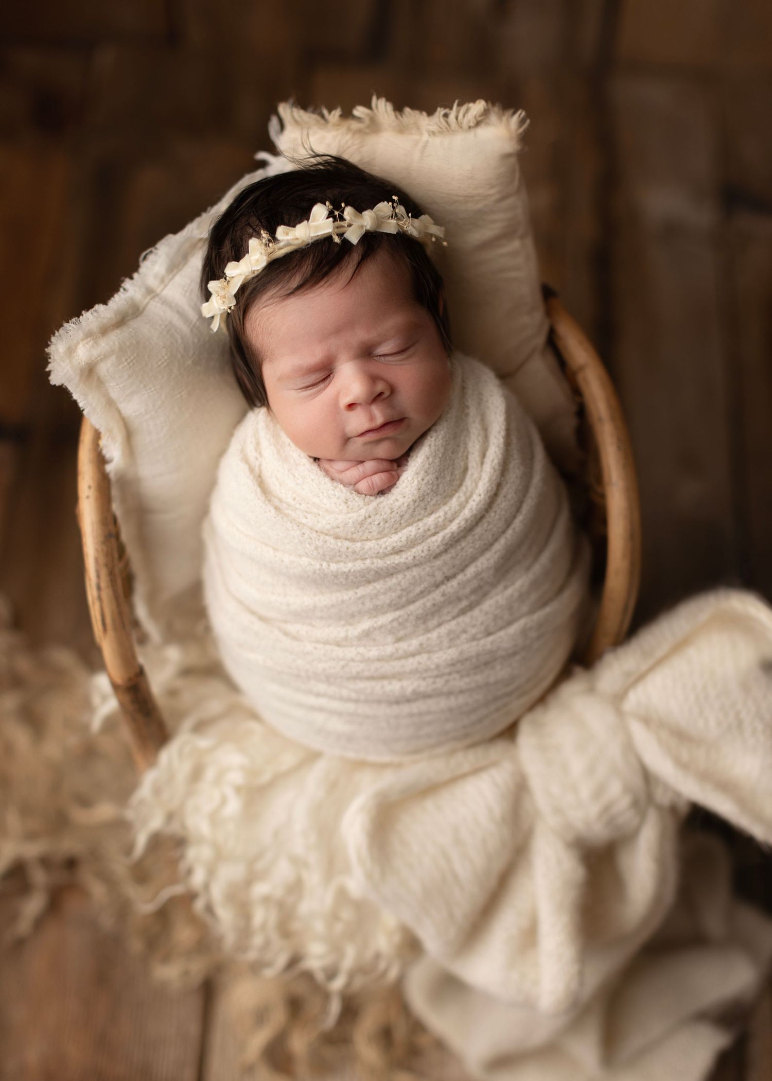 Newborn photography session, baby girl asleep on a blanket. Elizabeth Lang Photography Cloverdale Surrey Vancouver. Baby smiles in a bamboo